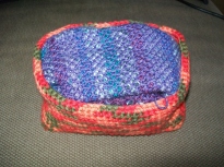 Basket with Tunisian honeycomb mitts-in-progress inside